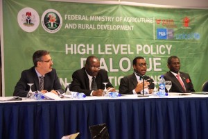 Dr. George Mavrotas, NSSP Program Leader, sits on a panel discussion with the Honorable Minister of Agriculture and Rural Development, Dr. Akinwunmi Adesina. ©IFPRI/Ian Masias