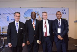 Panelists at the end of the plenary session on “Building a Resilient and Sustainable Agriculture in Africa”; from left to right: George Mavrotas (IFPRI-NSSP), Timothy Williams (Water Management Institute), Christopher Barrett (Cornell University), Abebe Simeles (AfDB)