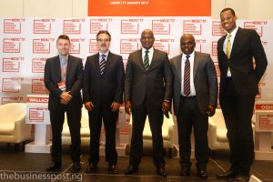 The panelists at the end of the main roundtable of the Conference. From left to right: P. Wallace (Bloomberg LP), G. Mavrotas (IFPRI), O. Okiti (Time Economics), A. Abdulhammeed (NIRSAL) and D. Oni (Ecobank Group).